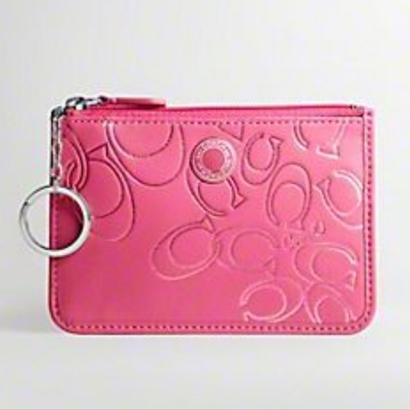 Coach Handbags - Vintage Coach Poppy wristlet featuring a silver signature monogram pattern